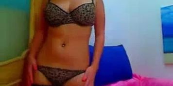 Busty brunette girl on webcam stripteasing and playing with her big boobs