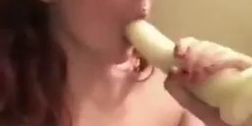 Tattoed redhead having fun with two dildos