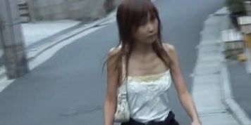 Slim Japanese girlie gets boob sharked on the street.