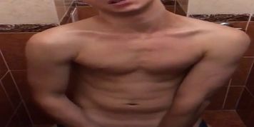 Speedo boy get horny in swimming pool and cum in toilet