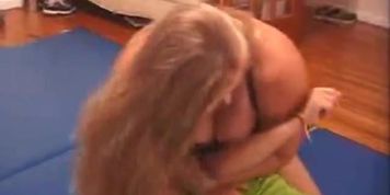 Amazon Katrina rolls him around with Jiu Jitsu (Tania Amazon)