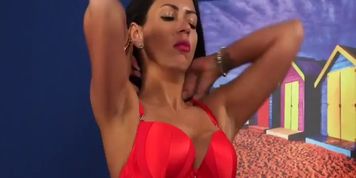 Tattooed milf mistress shows off sexy ass