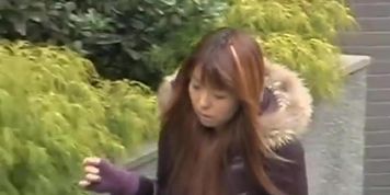 Vocal long-legged Japanese girl gets on the ground during sharking action